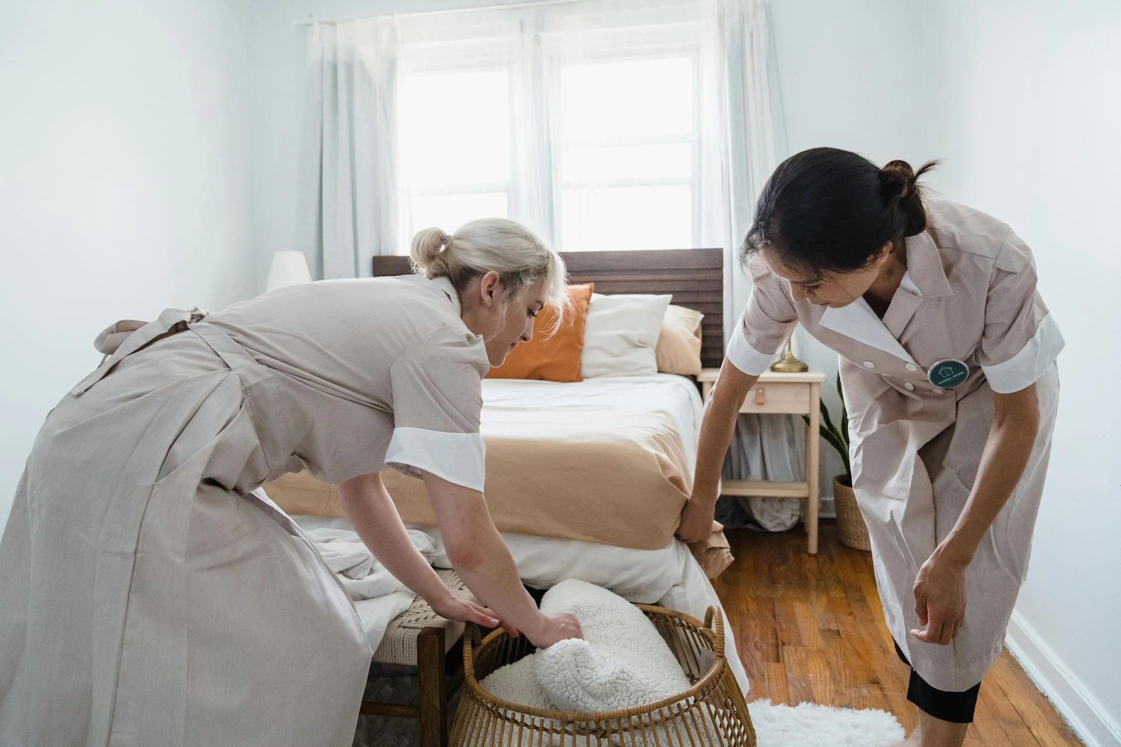 Caregivers folding laundry